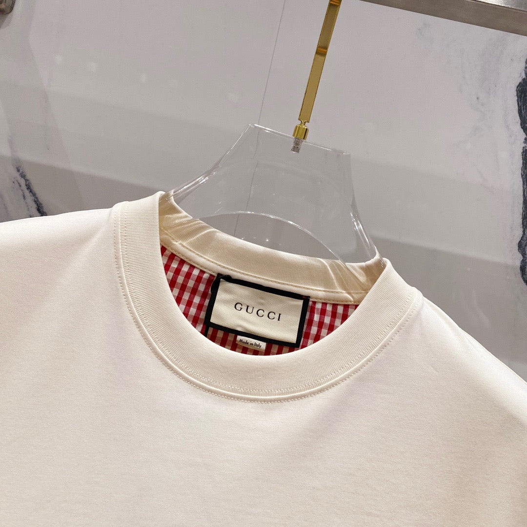 Gucci Blade Logo Printed T-shirt In Cream